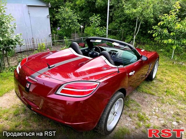 Красный Сатурн Скай, объемом двигателя 2 л и пробегом 252 тыс. км за 14999 $, фото 2 на Automoto.ua