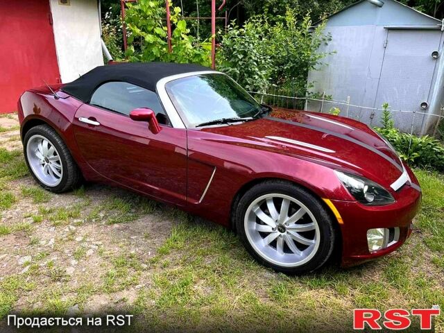 Красный Сатурн Скай, объемом двигателя 2 л и пробегом 252 тыс. км за 14999 $, фото 3 на Automoto.ua