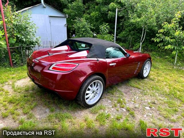 Красный Сатурн Скай, объемом двигателя 2 л и пробегом 252 тыс. км за 14999 $, фото 1 на Automoto.ua