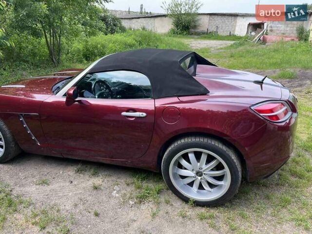 Червоний Сатурн Red line, об'ємом двигуна 2 л та пробігом 225 тис. км за 12500 $, фото 4 на Automoto.ua