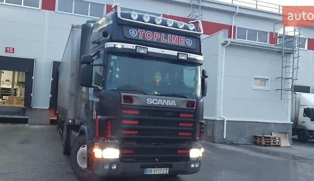 Черный Сканиа Р 124, объемом двигателя 11.7 л и пробегом 450 тыс. км за 10200 $, фото 2 на Automoto.ua