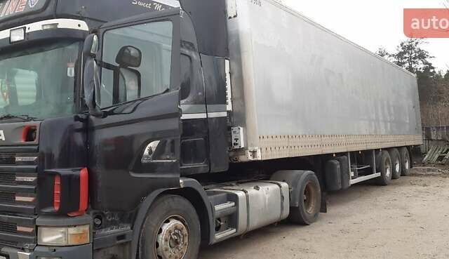 Черный Сканиа Р 124, объемом двигателя 11.7 л и пробегом 450 тыс. км за 10200 $, фото 1 на Automoto.ua