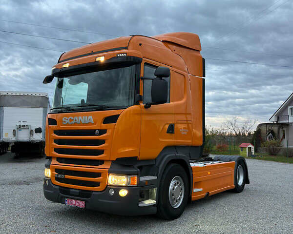 Помаранчевий Сканіа R 410, об'ємом двигуна 12.7 л та пробігом 953 тис. км за 29900 $, фото 1 на Automoto.ua