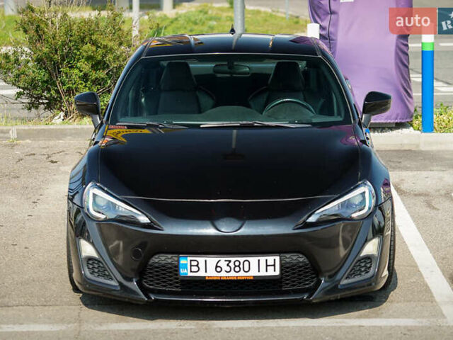 Черный Сцион FR-S, объемом двигателя 2 л и пробегом 120 тыс. км за 20050 $, фото 1 на Automoto.ua