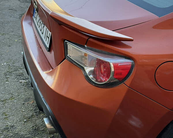 Оранжевый Сцион FR-S, объемом двигателя 2 л и пробегом 160 тыс. км за 13100 $, фото 12 на Automoto.ua