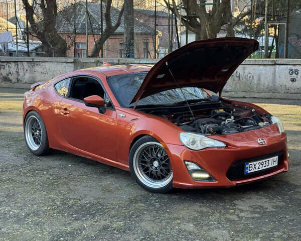 Оранжевый Сцион FR-S, объемом двигателя 2 л и пробегом 160 тыс. км за 13100 $, фото 40 на Automoto.ua