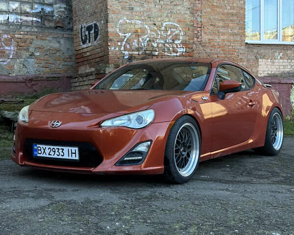 Оранжевый Сцион FR-S, объемом двигателя 2 л и пробегом 160 тыс. км за 14300 $, фото 1 на Automoto.ua