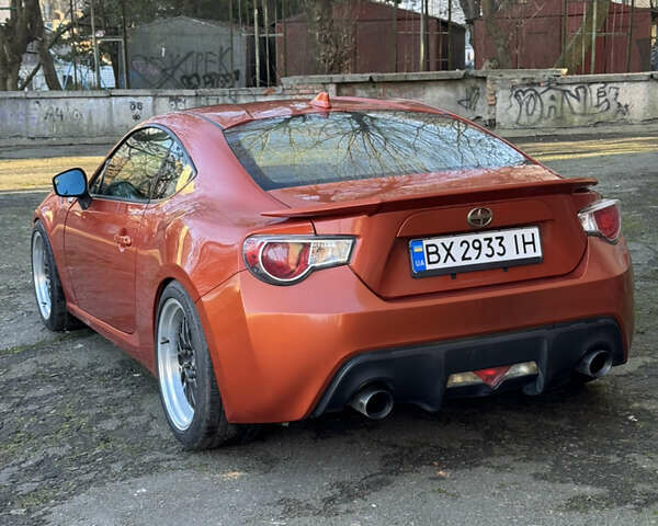 Оранжевый Сцион FR-S, объемом двигателя 2 л и пробегом 160 тыс. км за 14300 $, фото 10 на Automoto.ua