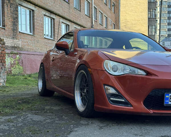 Оранжевый Сцион FR-S, объемом двигателя 2 л и пробегом 160 тыс. км за 13100 $, фото 3 на Automoto.ua