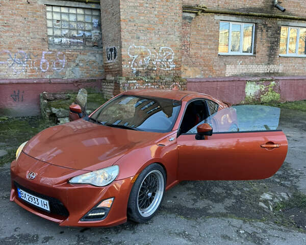 Оранжевый Сцион FR-S, объемом двигателя 2 л и пробегом 160 тыс. км за 13100 $, фото 23 на Automoto.ua