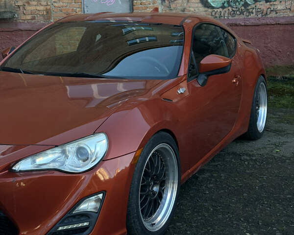 Оранжевый Сцион FR-S, объемом двигателя 2 л и пробегом 160 тыс. км за 13100 $, фото 4 на Automoto.ua