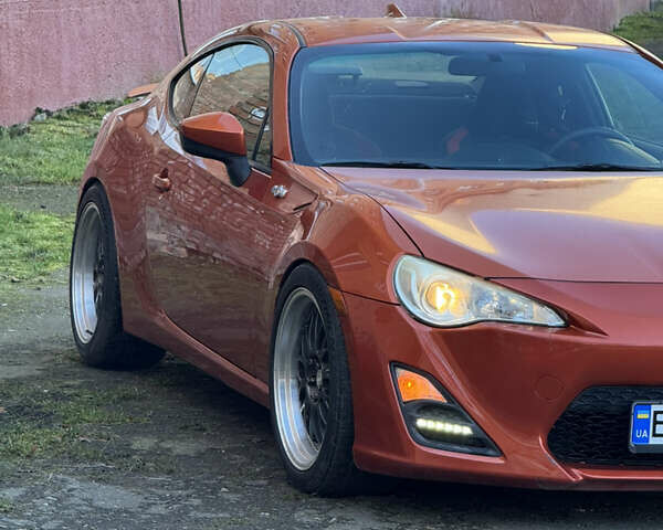 Оранжевый Сцион FR-S, объемом двигателя 2 л и пробегом 160 тыс. км за 13100 $, фото 19 на Automoto.ua