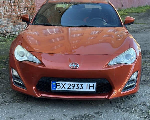 Оранжевый Сцион FR-S, объемом двигателя 2 л и пробегом 160 тыс. км за 14300 $, фото 2 на Automoto.ua