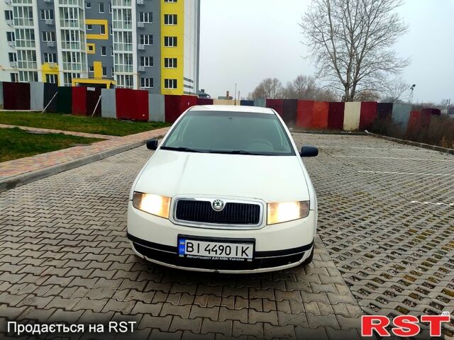 Белый Шкода Фабия, объемом двигателя 1.4 л и пробегом 257 тыс. км за 2500 $, фото 1 на Automoto.ua