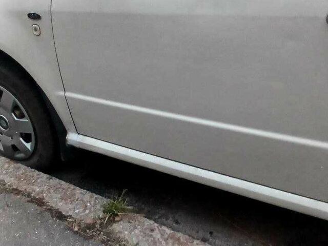 Белый Шкода Фабия, объемом двигателя 1.4 л и пробегом 165 тыс. км за 4350 $, фото 2 на Automoto.ua