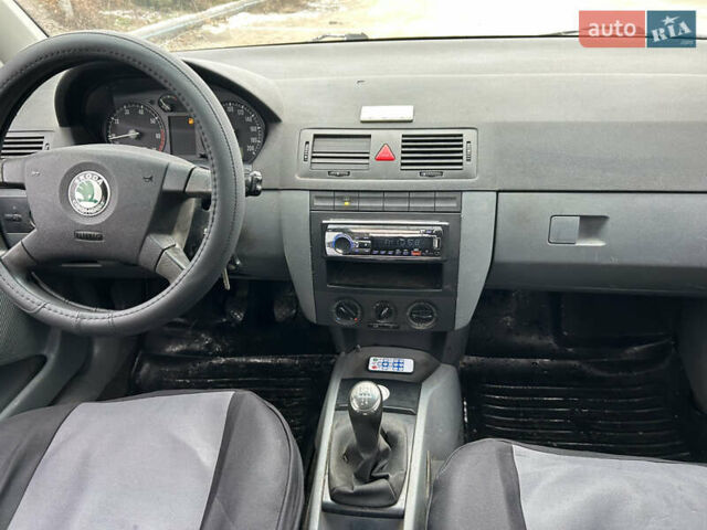 Белый Шкода Фабия, объемом двигателя 1.2 л и пробегом 167 тыс. км за 2500 $, фото 7 на Automoto.ua