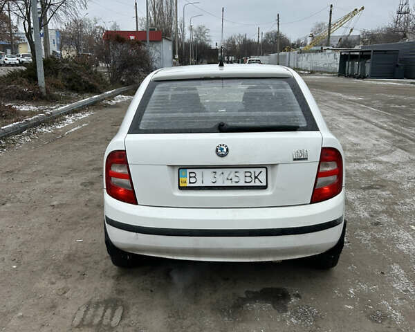 Белый Шкода Фабия, объемом двигателя 1.2 л и пробегом 167 тыс. км за 2500 $, фото 4 на Automoto.ua