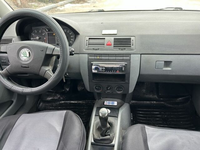 Белый Шкода Фабия, объемом двигателя 1.2 л и пробегом 167 тыс. км за 2500 $, фото 6 на Automoto.ua