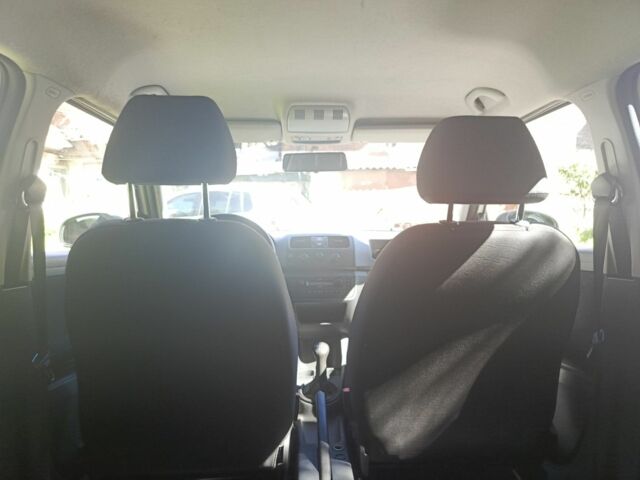 Белый Шкода Фабия, объемом двигателя 1.2 л и пробегом 225 тыс. км за 4000 $, фото 8 на Automoto.ua