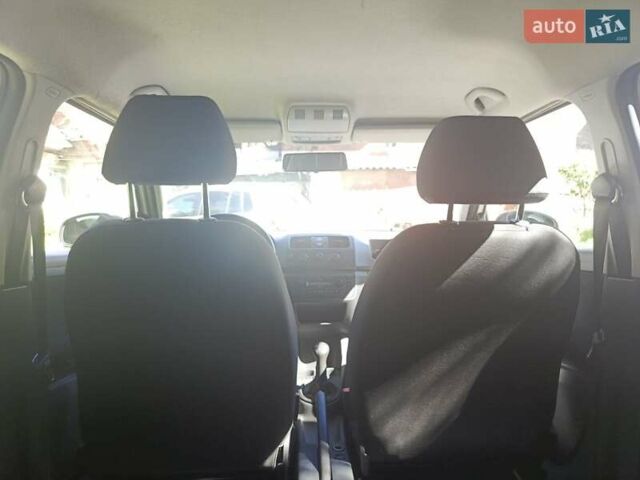 Белый Шкода Фабия, объемом двигателя 1.2 л и пробегом 225 тыс. км за 4000 $, фото 7 на Automoto.ua