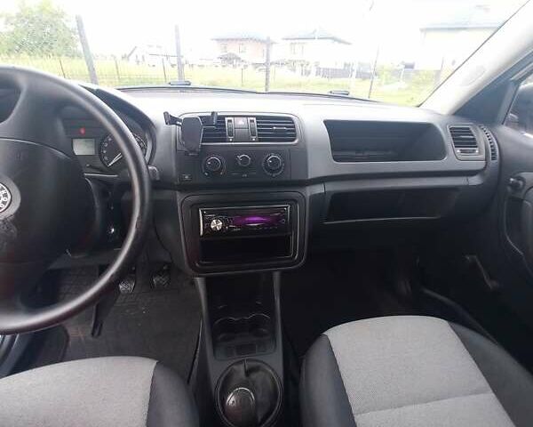 Белый Шкода Фабия, объемом двигателя 1.2 л и пробегом 185 тыс. км за 4700 $, фото 6 на Automoto.ua