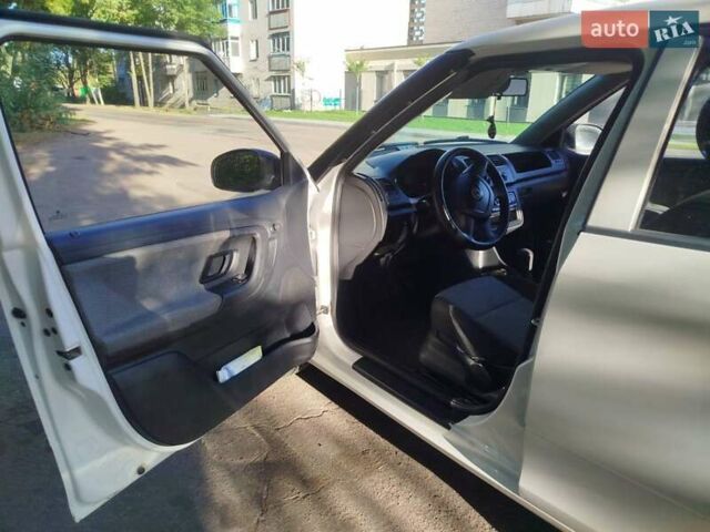 Белый Шкода Фабия, объемом двигателя 1.2 л и пробегом 165 тыс. км за 5200 $, фото 4 на Automoto.ua