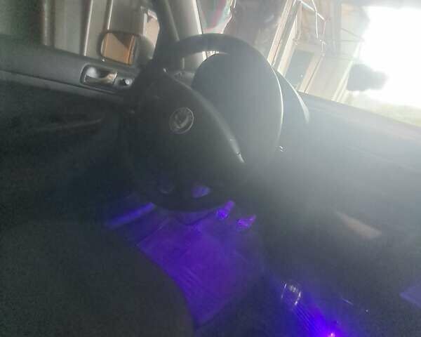 Белый Шкода Фабия, объемом двигателя 1.4 л и пробегом 313 тыс. км за 3000 $, фото 2 на Automoto.ua