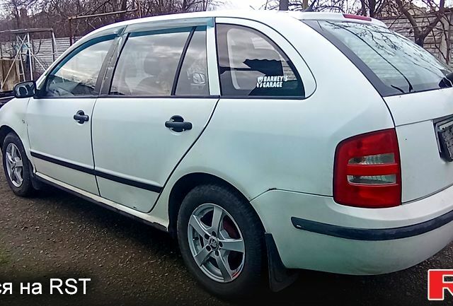 Белый Шкода Фабия, объемом двигателя 1.4 л и пробегом 285 тыс. км за 2350 $, фото 6 на Automoto.ua