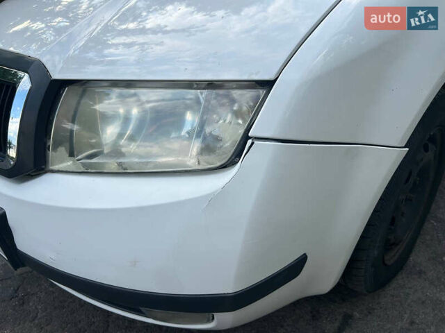 Белый Шкода Фабия, объемом двигателя 1.39 л и пробегом 290 тыс. км за 2500 $, фото 11 на Automoto.ua