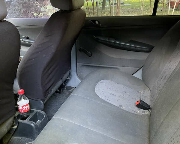 Белый Шкода Фабия, объемом двигателя 1.2 л и пробегом 330 тыс. км за 200 $, фото 5 на Automoto.ua