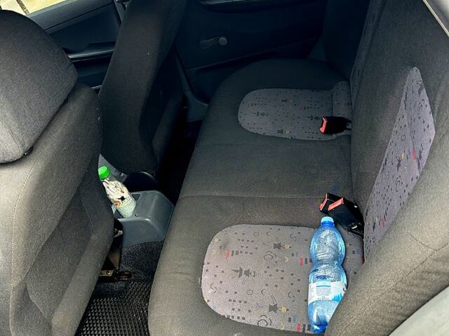 Белый Шкода Фабия, объемом двигателя 1.2 л и пробегом 235 тыс. км за 2900 $, фото 6 на Automoto.ua