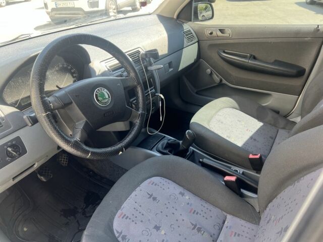 Білий Шкода Фабія, об'ємом двигуна 1.2 л та пробігом 325 тис. км за 2800 $, фото 7 на Automoto.ua