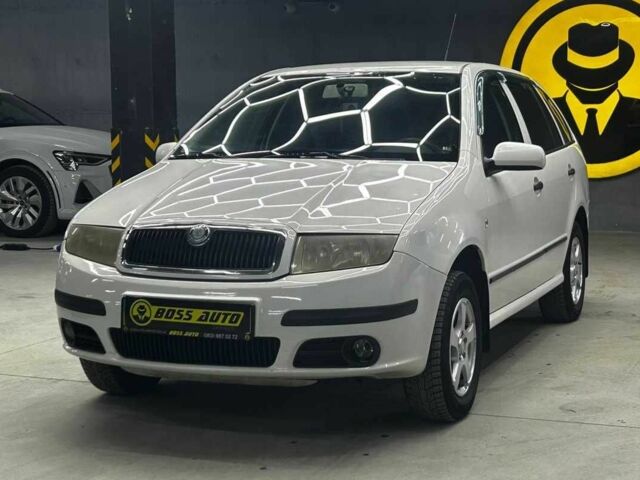 Белый Шкода Фабия, объемом двигателя 1.4 л и пробегом 293 тыс. км за 4700 $, фото 2 на Automoto.ua