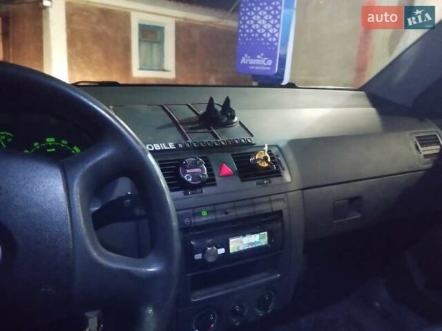 Белый Шкода Фабия, объемом двигателя 1.2 л и пробегом 260 тыс. км за 3650 $, фото 6 на Automoto.ua