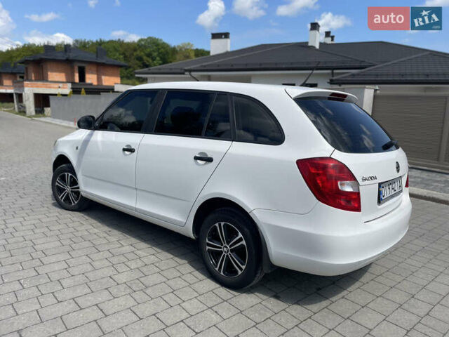 Білий Шкода Фабія, об'ємом двигуна 1.2 л та пробігом 297 тис. км за 5600 $, фото 4 на Automoto.ua