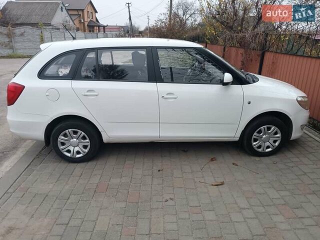 Белый Шкода Фабия, объемом двигателя 1.39 л и пробегом 266 тыс. км за 6500 $, фото 19 на Automoto.ua