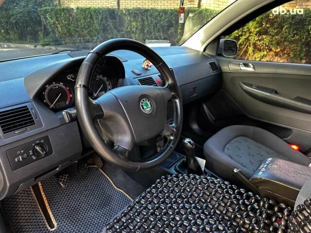 Бежевий Шкода Фабія, об'ємом двигуна 1.4 л та пробігом 190 тис. км за 5690 $, фото 9 на Automoto.ua