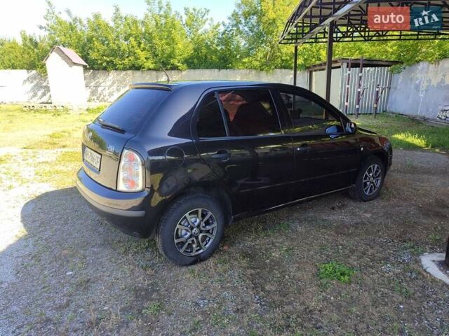 Черный Шкода Фабия, объемом двигателя 1.4 л и пробегом 290 тыс. км за 4500 $, фото 3 на Automoto.ua