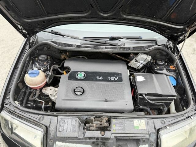 Черный Шкода Фабия, объемом двигателя 1.4 л и пробегом 201 тыс. км за 4100 $, фото 23 на Automoto.ua