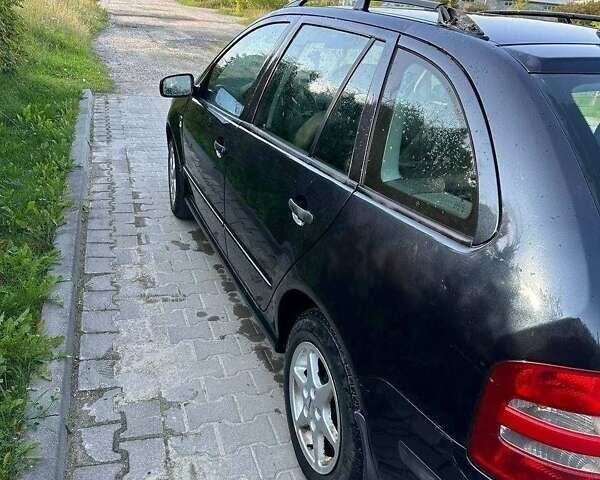 Черный Шкода Фабия, объемом двигателя 1.9 л и пробегом 452 тыс. км за 3800 $, фото 2 на Automoto.ua