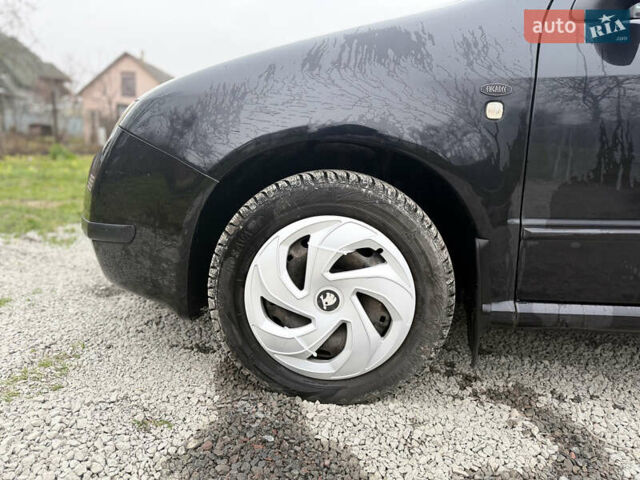 Чорний Шкода Фабія, об'ємом двигуна 1.39 л та пробігом 201 тис. км за 3750 $, фото 1 на Automoto.ua