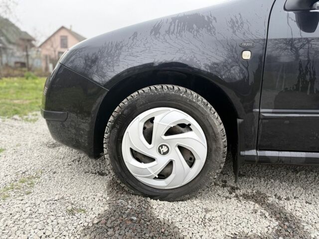 Черный Шкода Фабия, объемом двигателя 1.4 л и пробегом 201 тыс. км за 4100 $, фото 3 на Automoto.ua