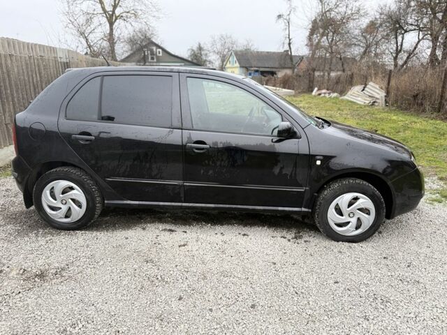 Черный Шкода Фабия, объемом двигателя 1.4 л и пробегом 201 тыс. км за 4100 $, фото 8 на Automoto.ua