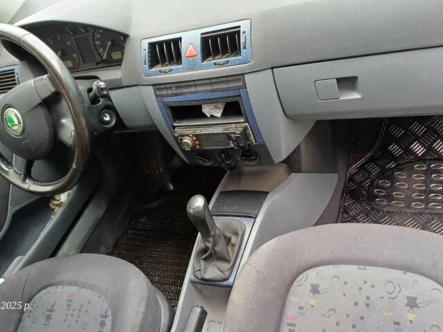 Черный Шкода Фабия, объемом двигателя 1 л и пробегом 240 тыс. км за 1900 $, фото 2 на Automoto.ua