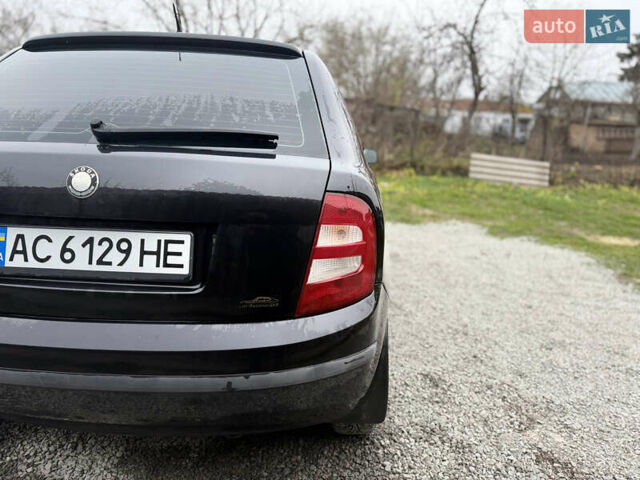 Чорний Шкода Фабія, об'ємом двигуна 1.39 л та пробігом 201 тис. км за 3750 $, фото 31 на Automoto.ua