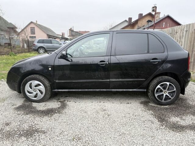 Черный Шкода Фабия, объемом двигателя 1.4 л и пробегом 201 тыс. км за 4100 $, фото 2 на Automoto.ua