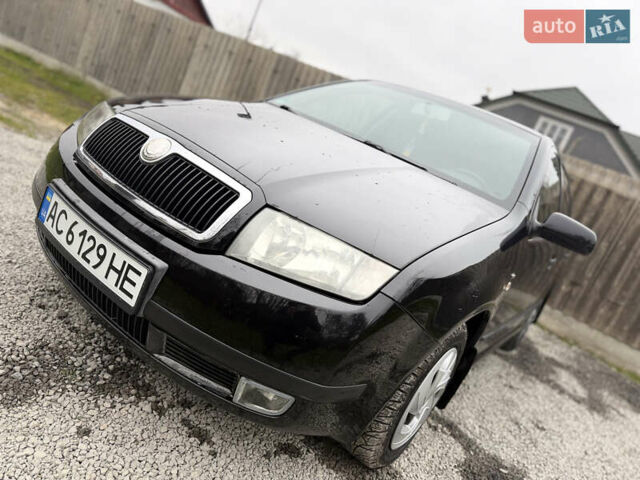 Чорний Шкода Фабія, об'ємом двигуна 1.39 л та пробігом 201 тис. км за 3750 $, фото 35 на Automoto.ua