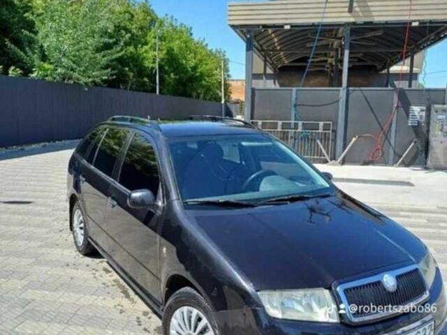 Черный Шкода Фабия, объемом двигателя 1 л и пробегом 240 тыс. км за 1900 $, фото 1 на Automoto.ua