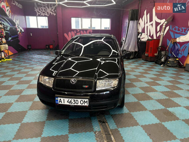 Черный Шкода Фабия, объемом двигателя 1.39 л и пробегом 275 тыс. км за 3999 $, фото 21 на Automoto.ua