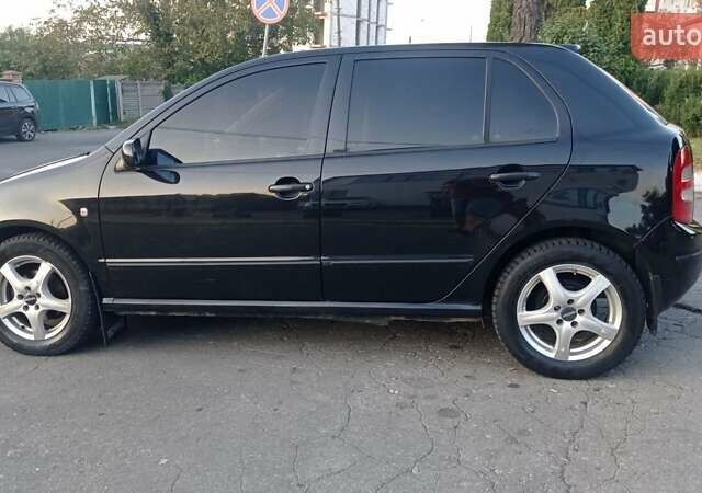 Черный Шкода Фабия, объемом двигателя 1.2 л и пробегом 260 тыс. км за 3450 $, фото 5 на Automoto.ua